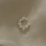 Handmade in Basel, Switzerland, this sustainable ear cuff showcases unique design and ethical materials.