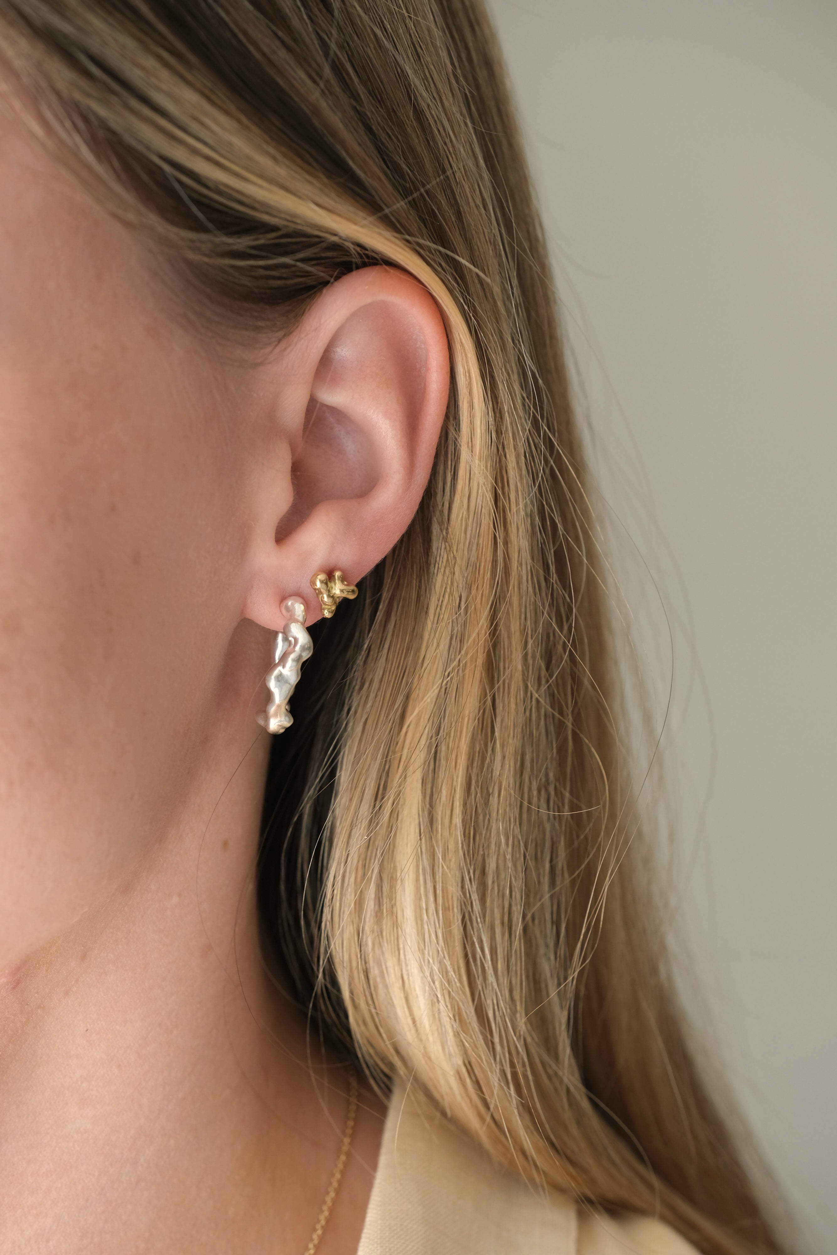 Ethical and sustainable earrings handmade in Basel, Switzerland, featuring unique design and shiny recycled silver.