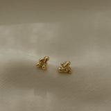 Handmade ethical and sustainable jewelry earrings in 18k recycled gold, designed in Basel, Switzerland.