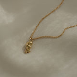 Handmade ethical 18k recycled gold necklace with unique pendant, designed in Basel, Switzerland.