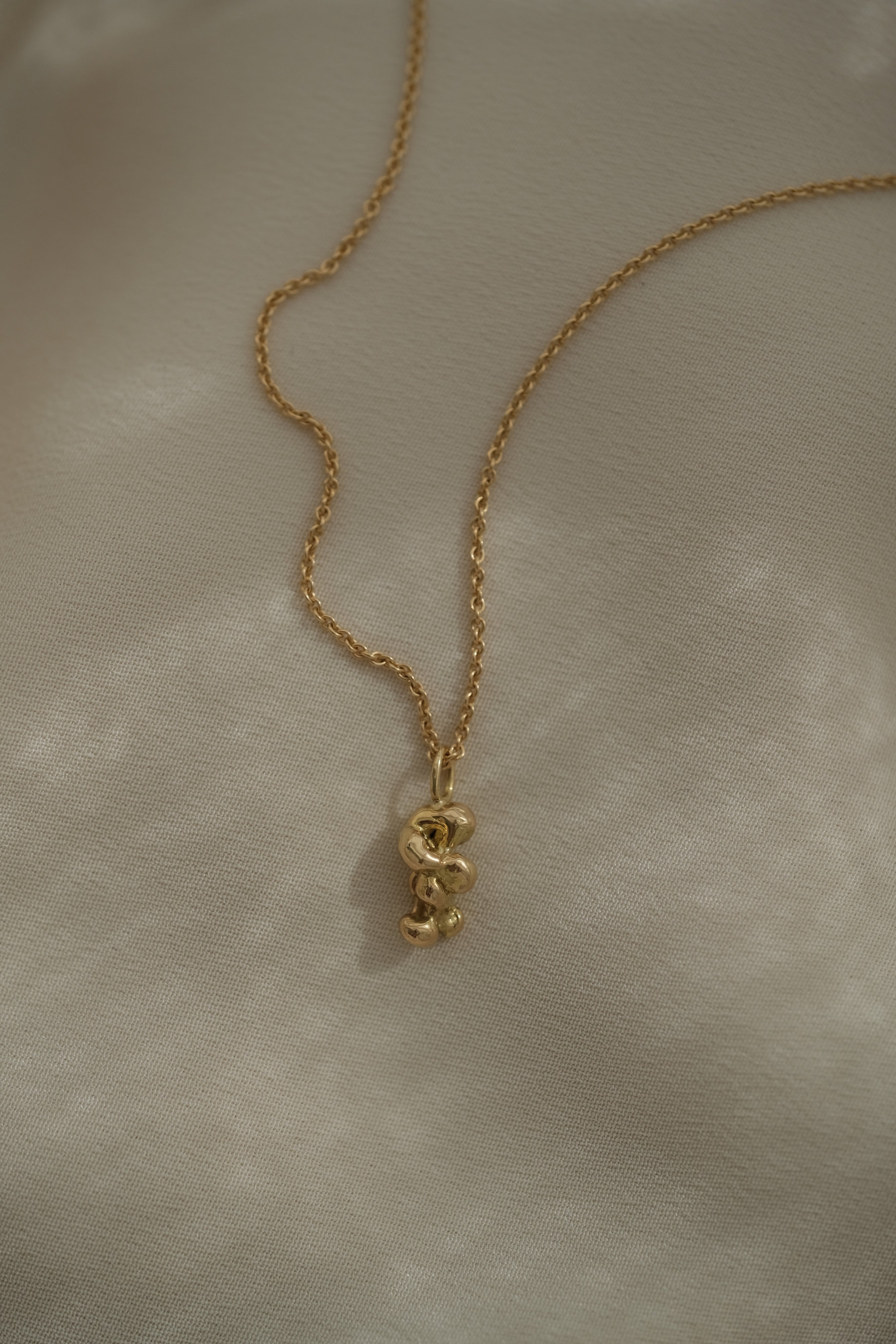 DROP 03 necklace, handmade in Basel, sustainable 18k recycled yellow gold, unique ethical jewelry.