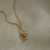 Handmade ethical necklace in recycled 18k gold, unique jewelry crafted in Basel, Switzerland.