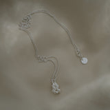 Unique handmade necklace featuring a satin-finished pendant in 925 recycled silver, crafted in Basel, Switzerland.