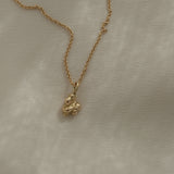 DROP 03 necklace in 18k recycled yellow gold, handmade in Basel, featuring unique ethical and sustainable design.