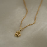 DROP 03 necklace handcrafted in Basel, Switzerland with recycled yellow gold, showcasing unique ethical design.