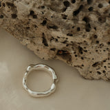 Handcrafted DROP 03 ring in 925 recycled silver, unique and sustainable jewelry, made in Basel, Switzerland.