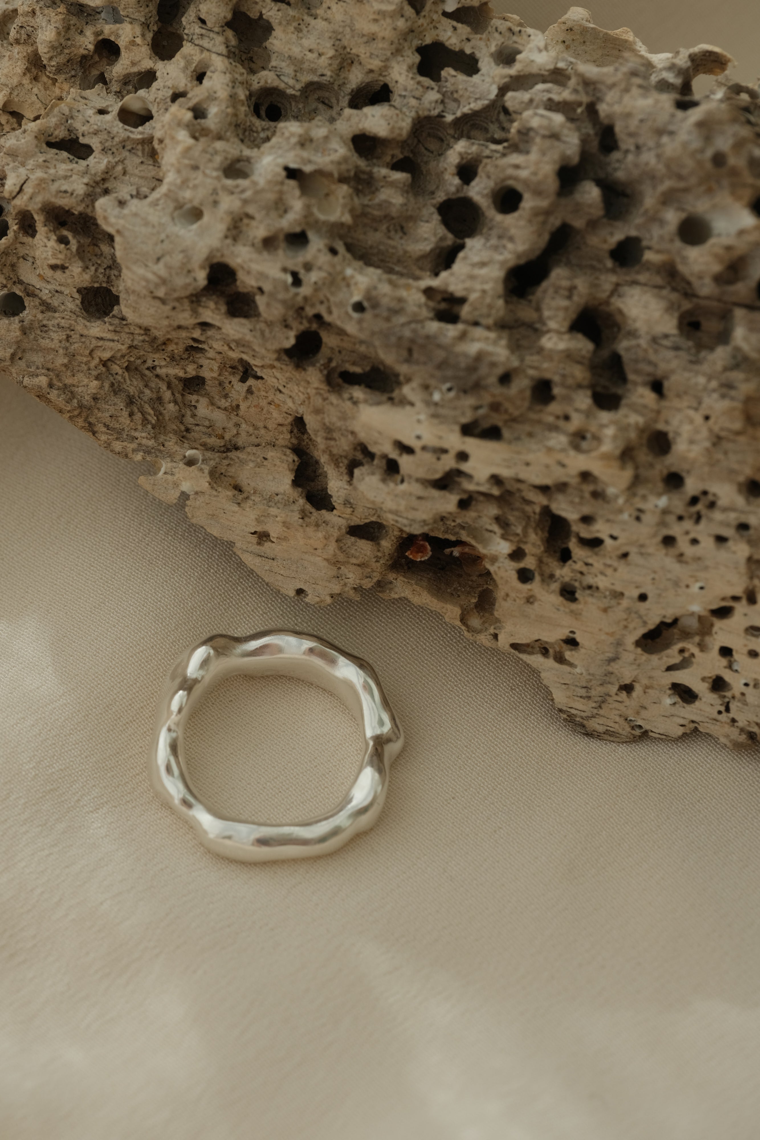 Handcrafted DROP 03 ring in 925 recycled silver, unique and sustainable jewelry, made in Basel, Switzerland.