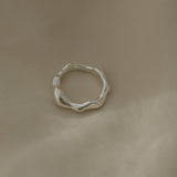 DROP 03 ring four, handmade in Basel, Switzerland, featuring unique, ethical 925 recycled silver jewelry.