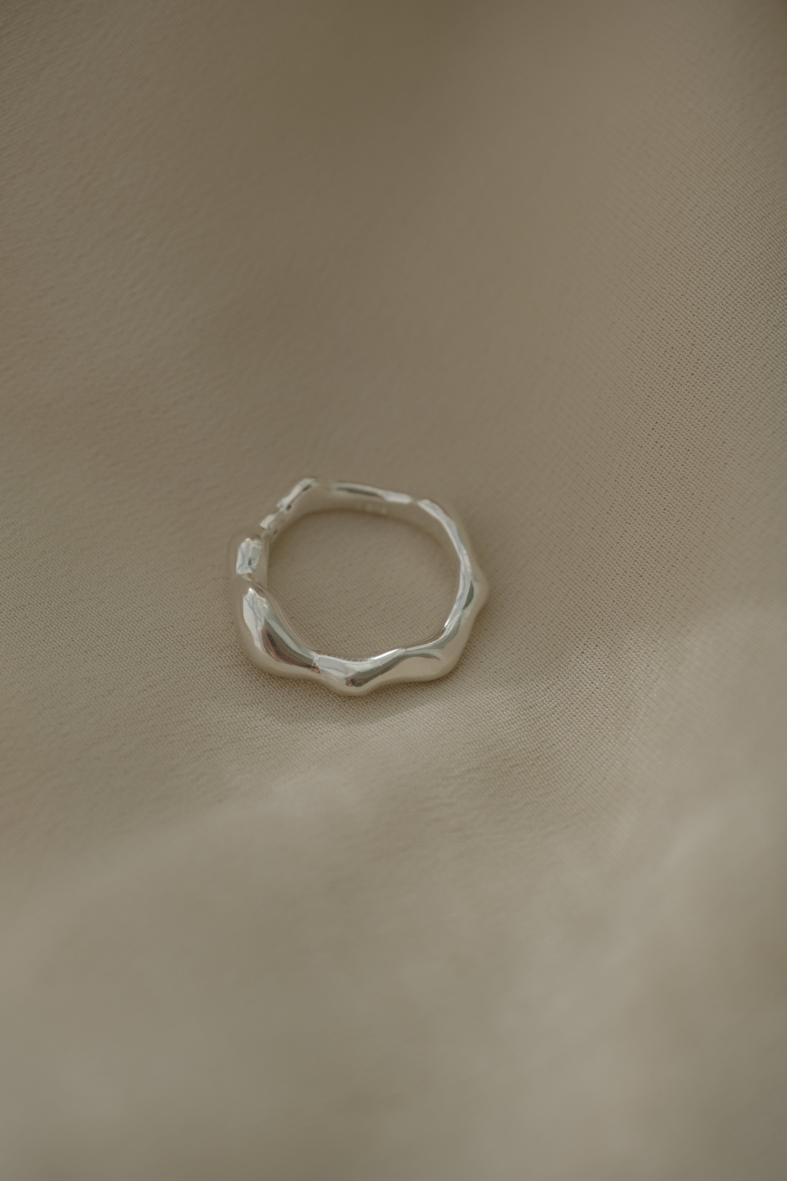 DROP 03 ring four, handmade in Basel, Switzerland, featuring unique, ethical 925 recycled silver jewelry.