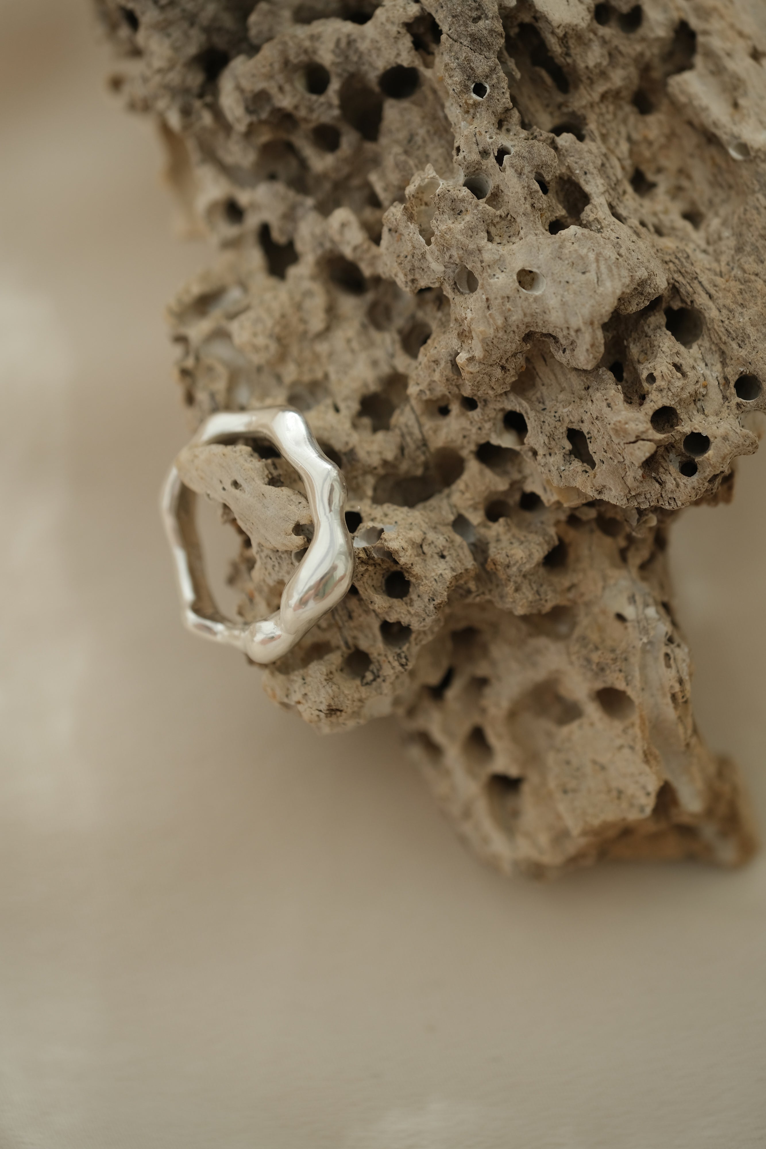 Handmade unique ring in recycled silver on natural stone, showcasing ethical and sustainable jewelry from Basel, Switzerland.