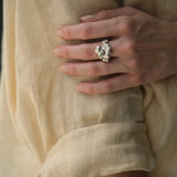 Handmade DROP 03 ring in 925 recycled silver, showcasing unique design by a Basel studio.