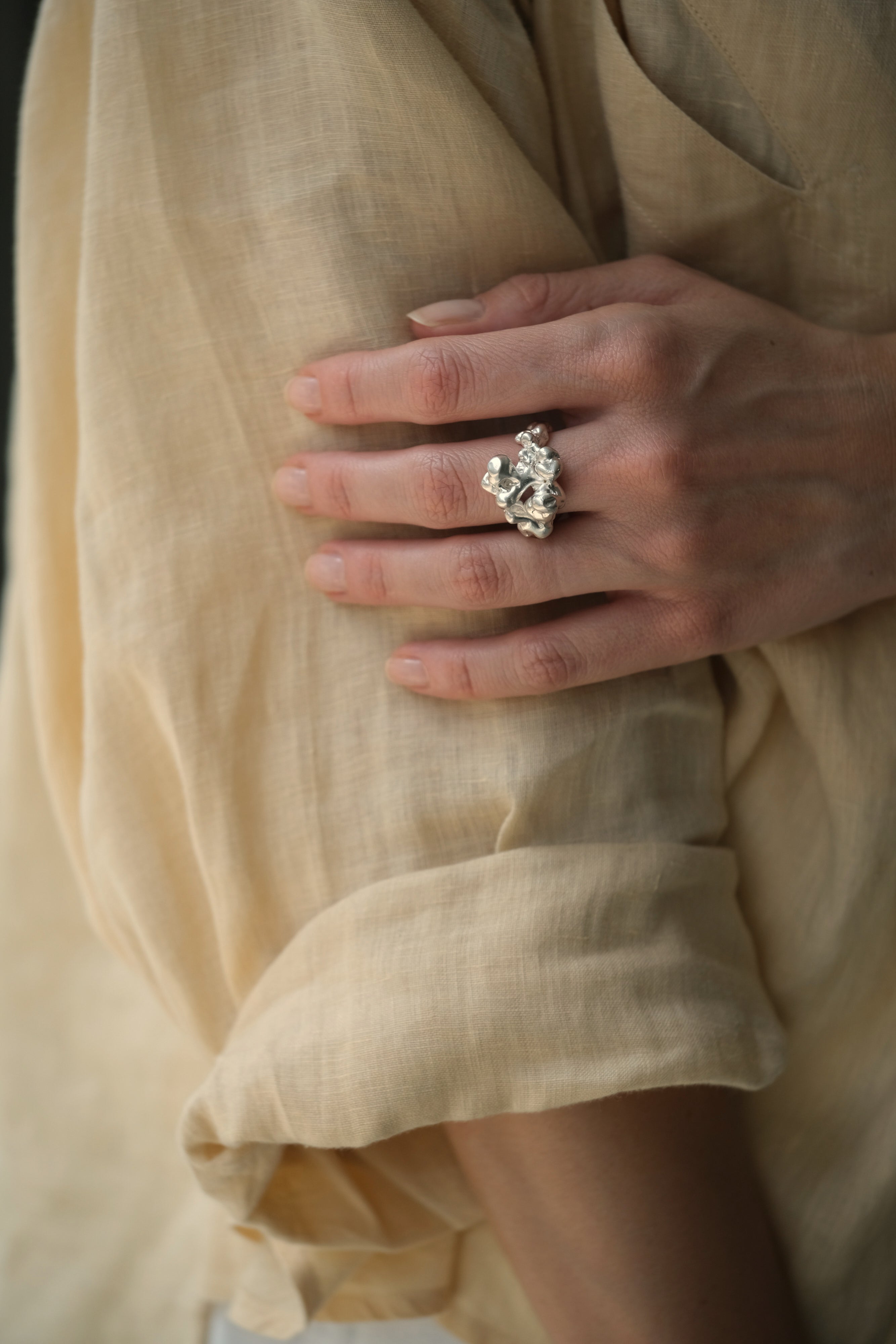 Handmade DROP 03 ring in 925 recycled silver, showcasing unique design by a Basel studio.