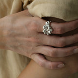 Handmade 925 recycled silver ring showcased on a hand, highlighting unique and sustainable jewelry design from Basel, Switzerland.