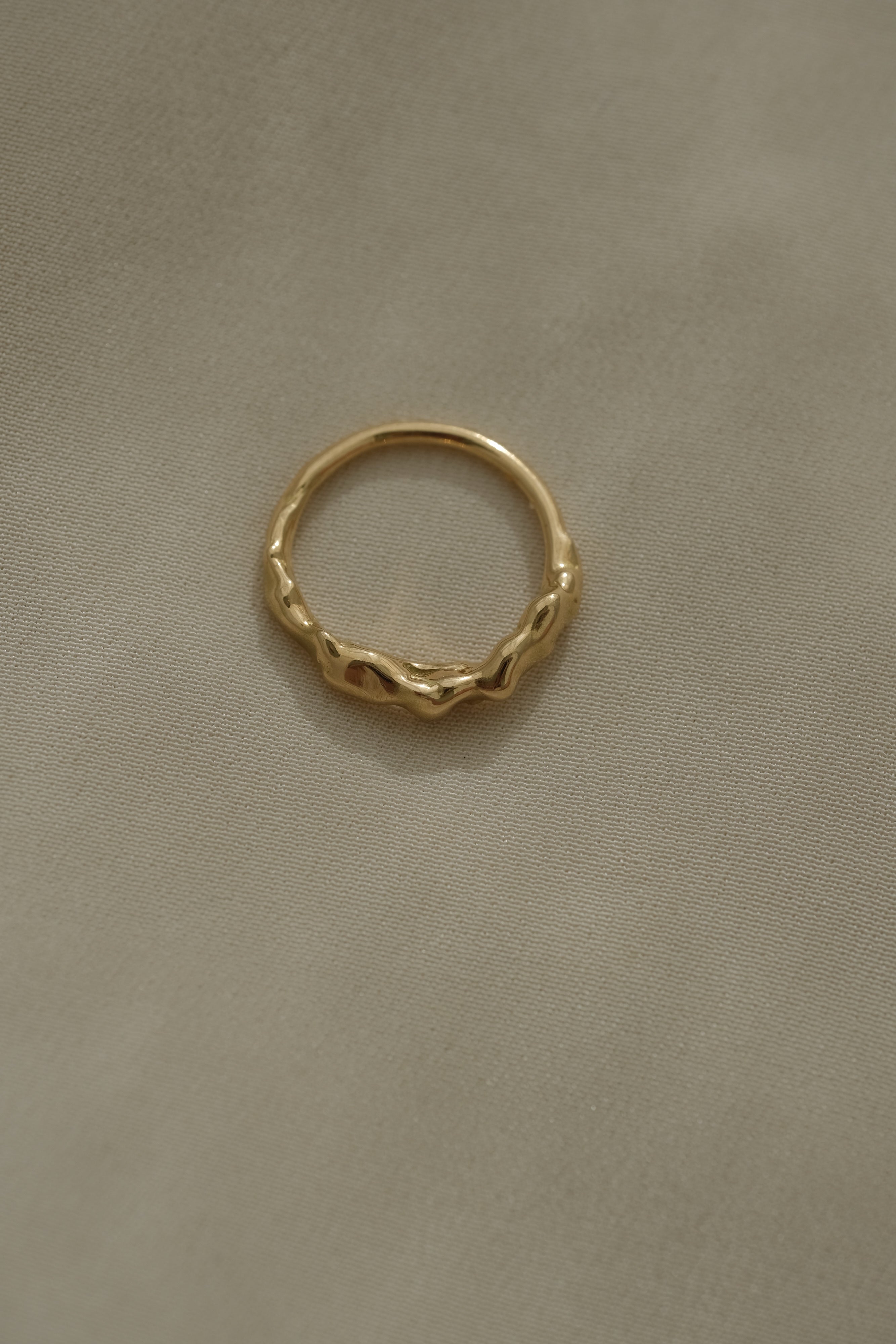 Handmade DROP 03 ring in recycled yellow gold, featuring a unique organic design, crafted in Basel, Switzerland.