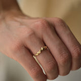 Handmade DROP 03 ring in 18k recycled yellow gold, showcasing ethical and sustainable jewelry crafted in Basel, Switzerland.