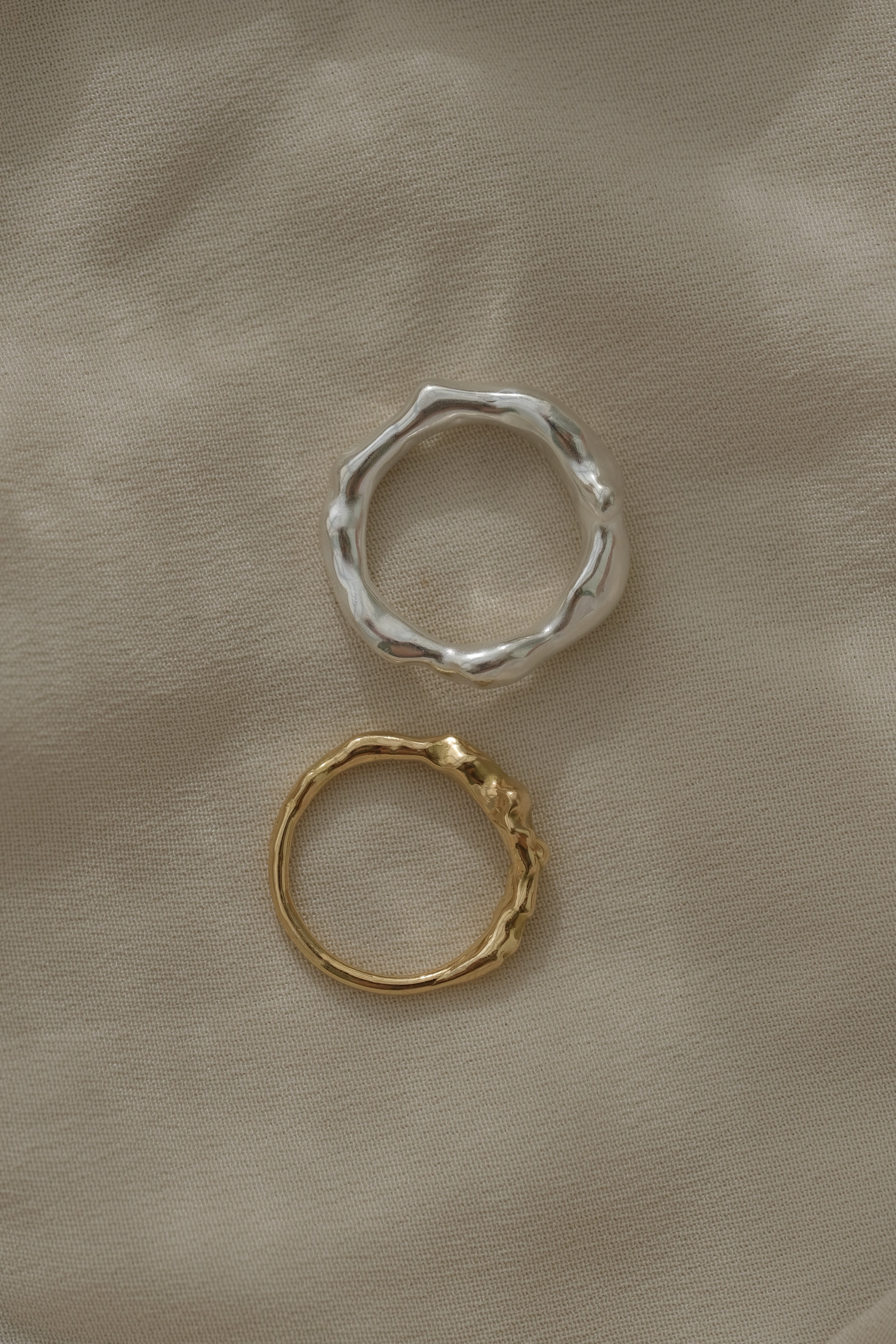 Handmade rings in silver and recycled gold showcasing unique, ethical jewelry crafted in Basel, Switzerland.