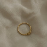 Handmade DROP 03 ring in recycled yellow gold, showcasing unique ethical jewelry, crafted in Basel, Switzerland.