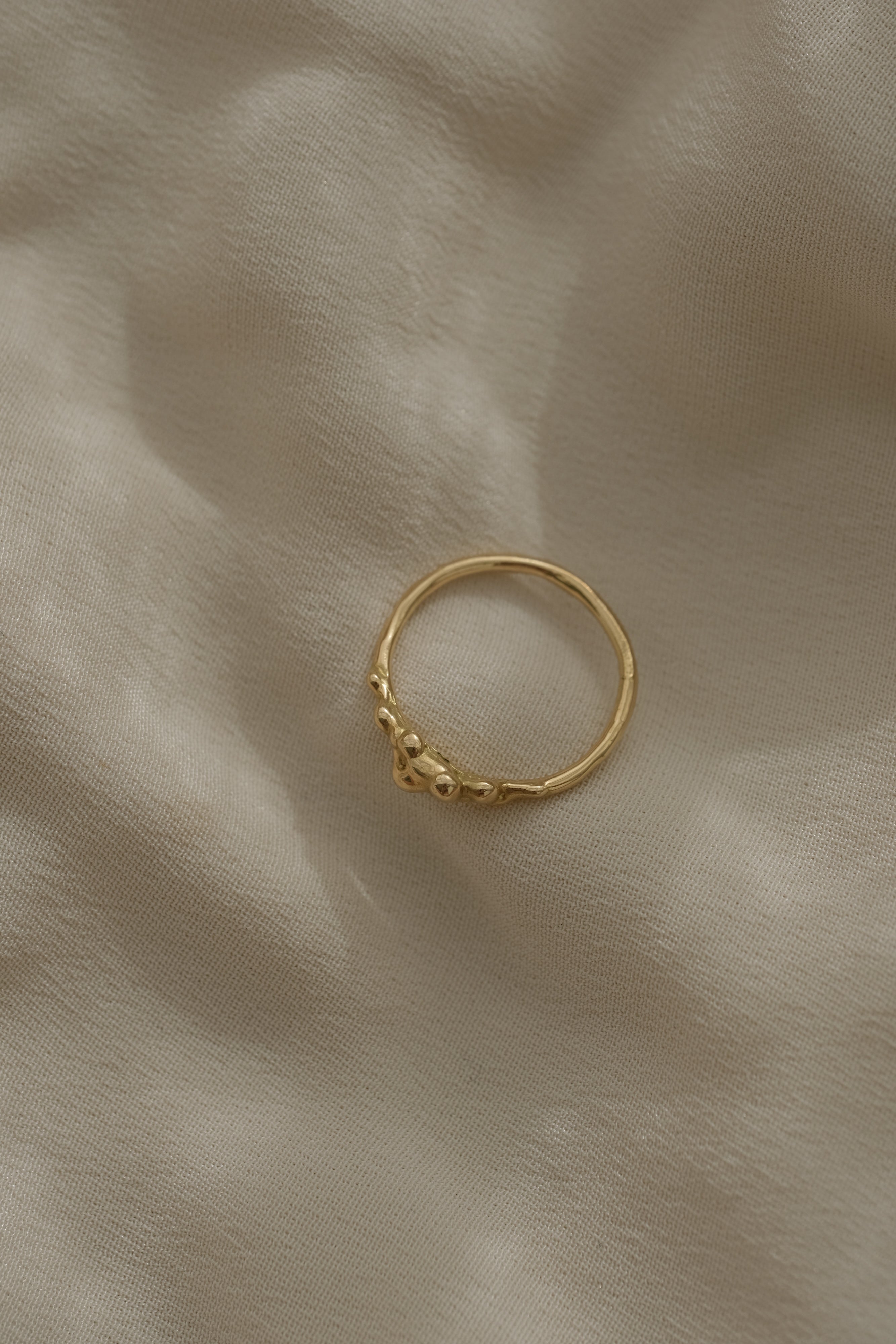 Handmade DROP 03 ring in 18k recycled yellow gold, unique ethical jewelry from Basel, Switzerland.