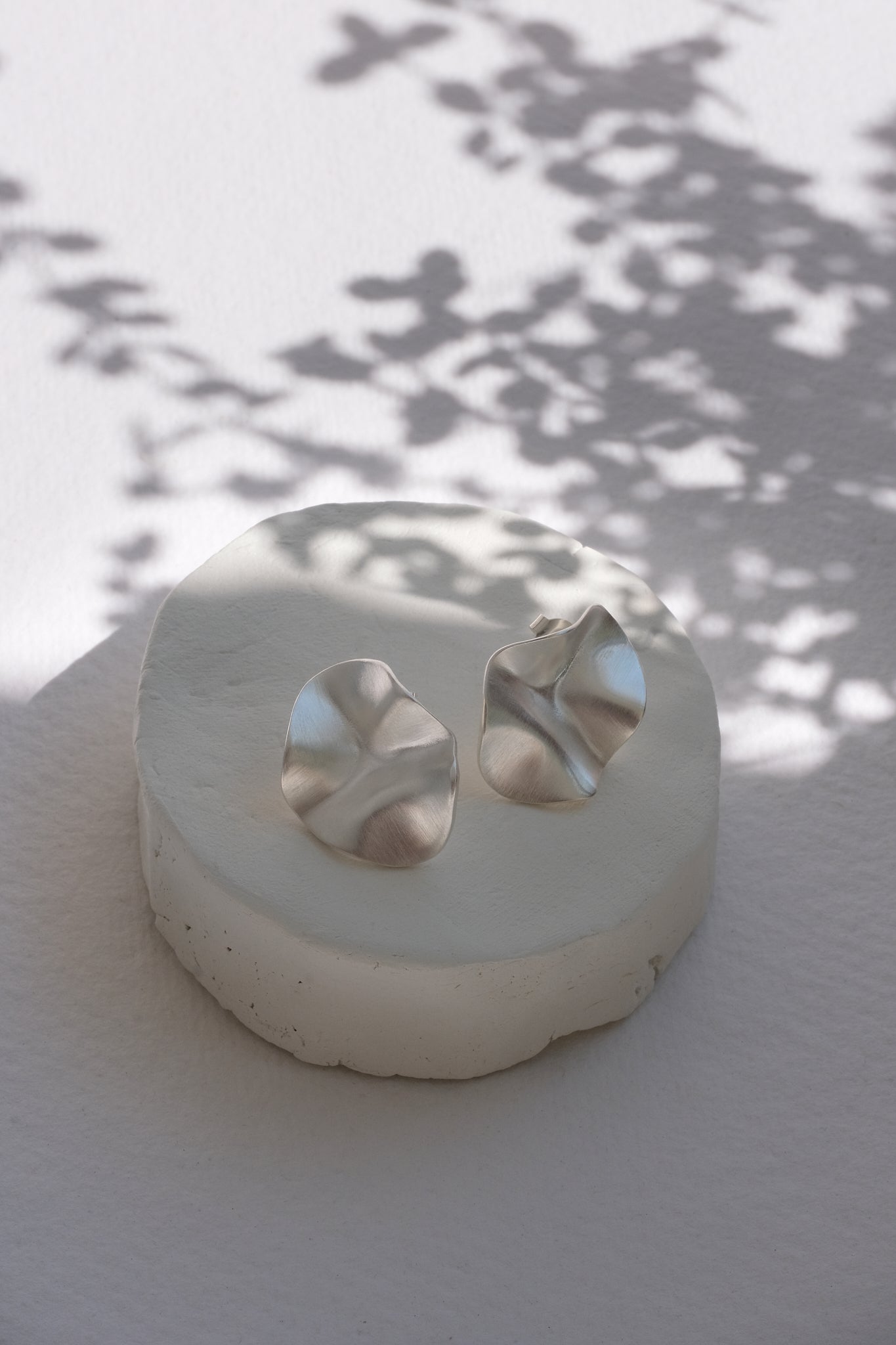 AROYO small earrings made of recycled silver; ethical and sustainable jewelry with a sleek design.