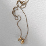 ONOA necklace, 18k gold-plated recycled silver, handmade ethical jewelry with a semi-matte finish.