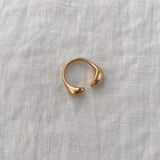 ONOA ring made of 18k gold-plated recycled silver, showcasing a handmade, ethical design.