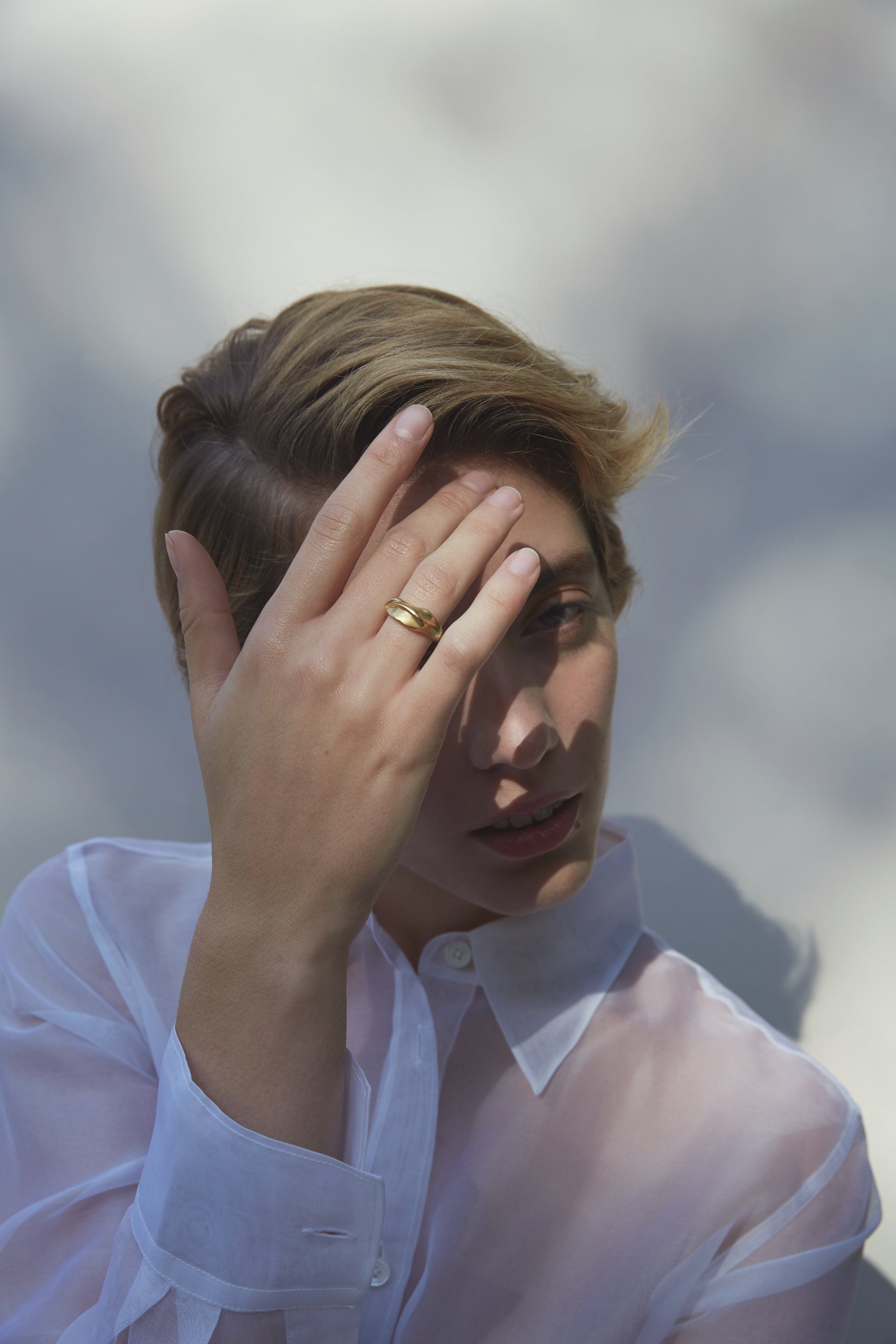 Model wearing YERERA big ring made of sustainable materials, showcasing ethical and handmade jewelry.