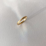 ISIA small ring in 18k gold-plated brass with a semi-matte hammered surface, handcrafted ethical jewelry.