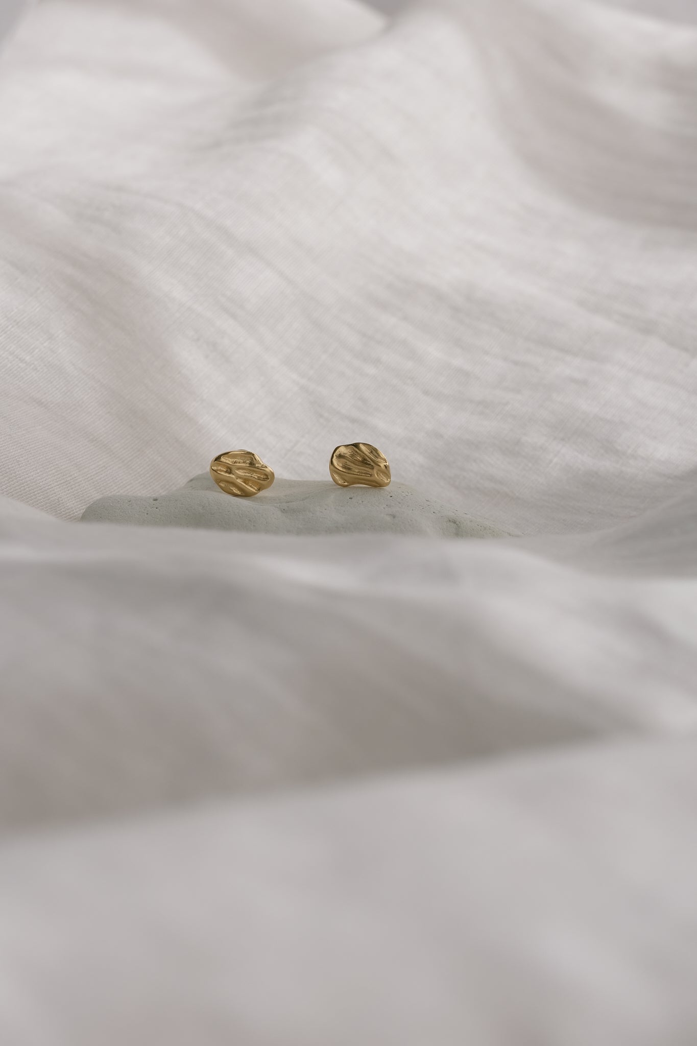 ELV earrings in 18k gold-plated recycled silver, showcasing ethical, handmade, and sustainable jewelry.