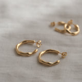 LUMI big earrings made of 18k gold-plated recycled silver, handcrafted ethical jewelry, featuring a natural shiny surface.