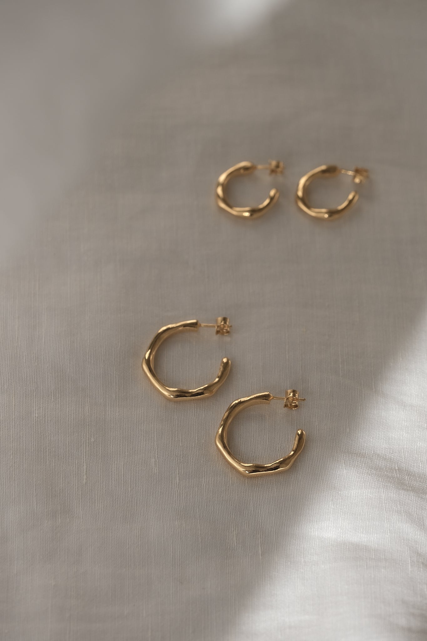 LUMI big earrings in 18k gold-plated recycled silver, showcasing handcrafted, ethical jewelry with a sustainable touch.