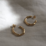 LUMI big earrings, handmade ethical jewelry in 18k recycled gold, showcasing sustainable design with a natural shine.