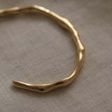 LUMI cuff bracelet in 18k gold-plated recycled silver, handmade, ethical jewelry, sustainable design.
