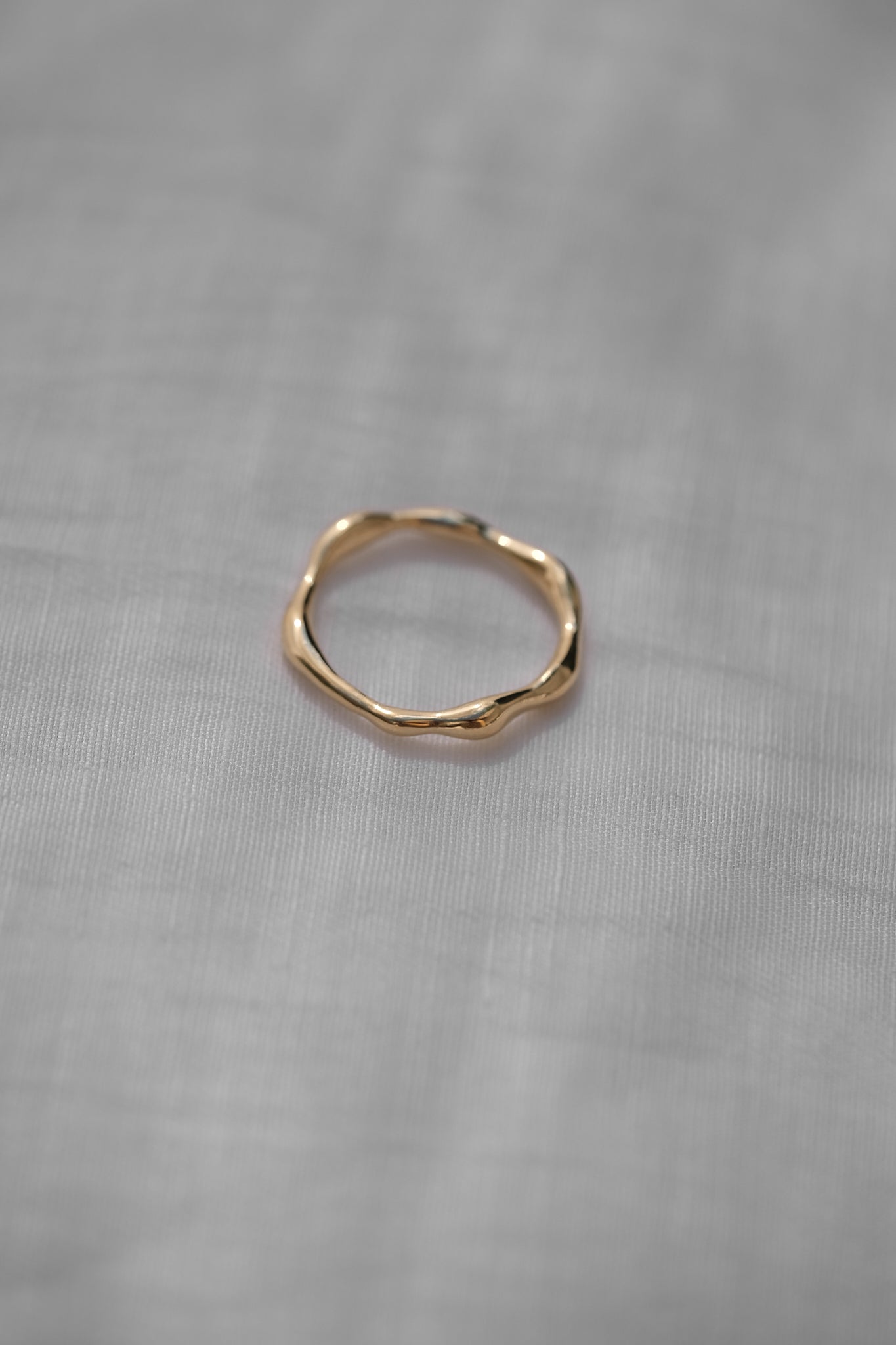 LUMI ring in 18k recycled gold, handcrafted in Basel, Switzerland with a natural shiny finish.