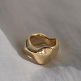 Handmade MOA ring in 18k gold plating, showcasing a natural shiny surface and ethical craftsmanship.