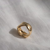 Handmade MOA ring in 18k gold-plated recycled silver, showcasing a natural shiny surface, symbolizing ethical jewelry.