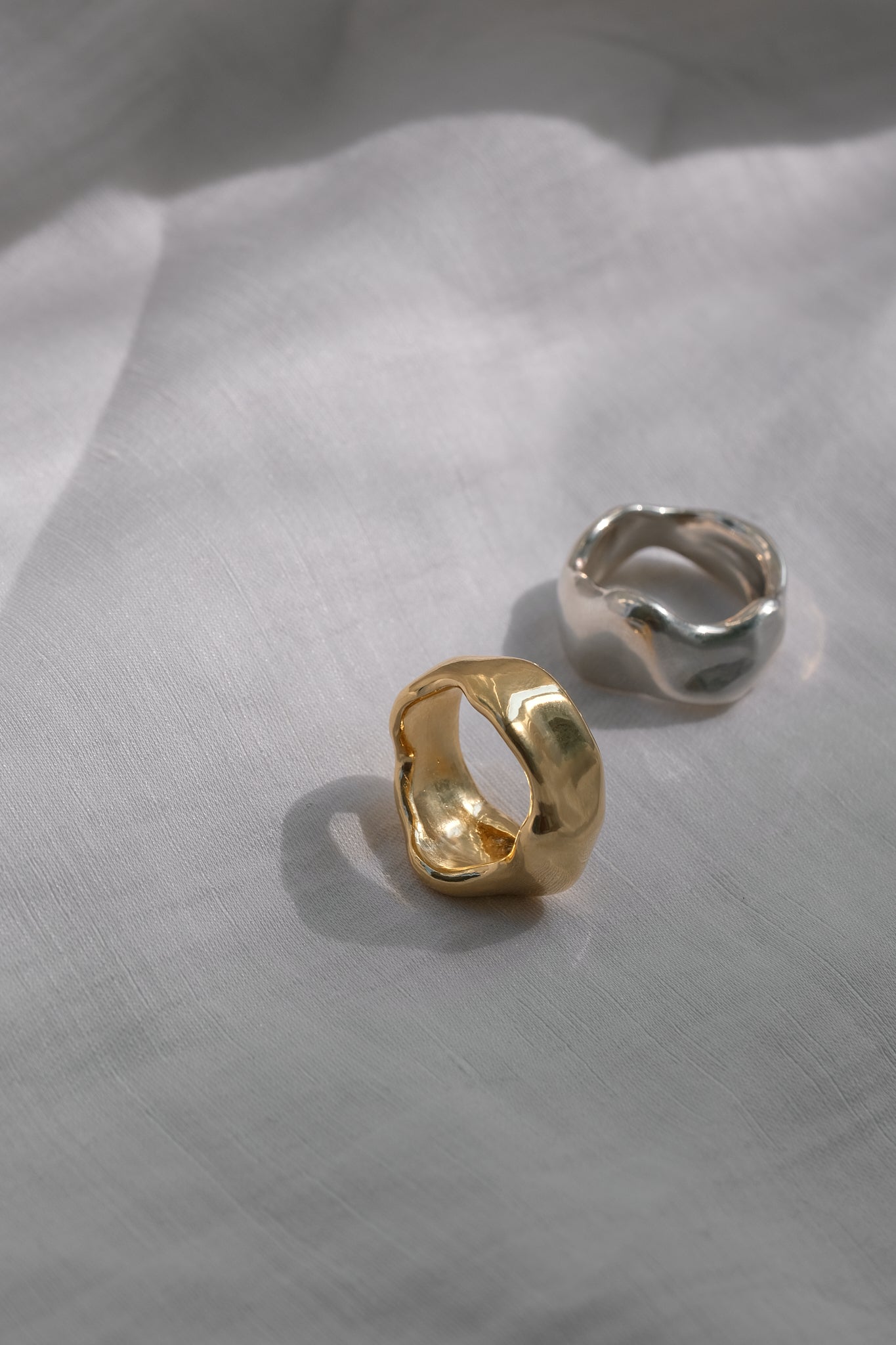 Handmade MOA ring in 18k gold-plated recycled silver and recycled sterling silver, showcasing sustainable, ethical jewelry.